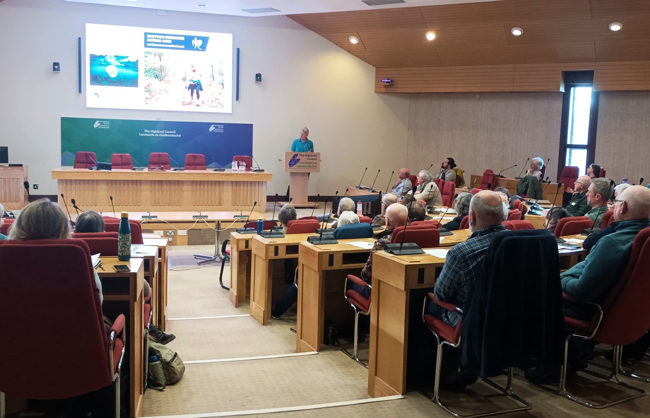Attendees of the Highland Biodiversity Conference watching a presentation