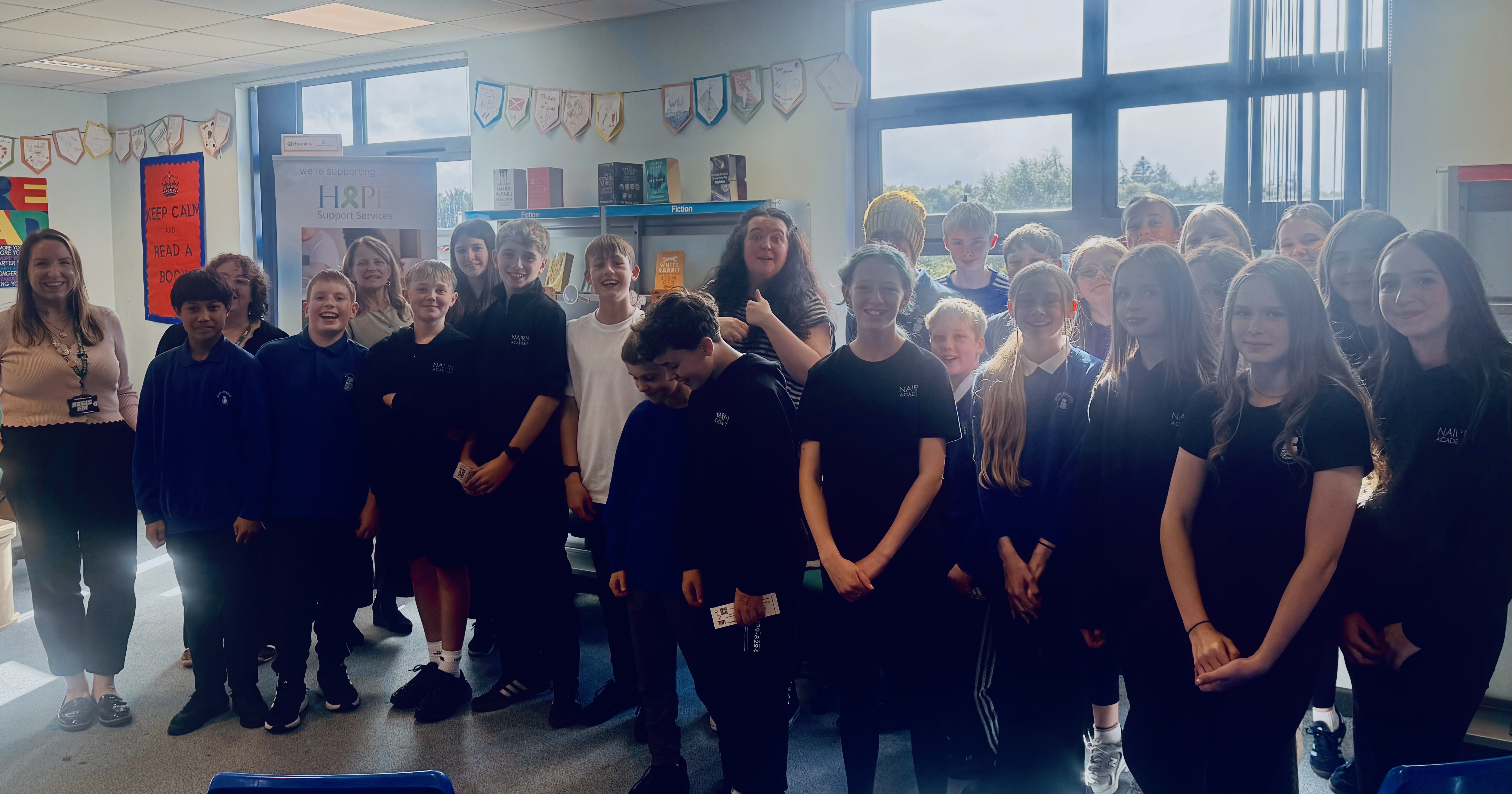 Ashley Storrie with pupils at Nairn Academy